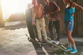 Life is a lot like skateboarding. Shot of a group of skaters standing together.