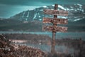 Life after people text quote engraved on wooden signpost outdoors in landscape looking polluted