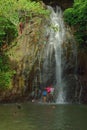 Bathing at the waterfall