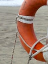 Life preserver on sandy beach Royalty Free Stock Photo