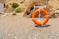 Life red sunset equipment protection buoy lifebuoy rescue lifesaver ring, from safe danger from guard from sea orange Royalty Free Stock Photo