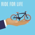 Life for ride, world health day cartoon vector illustration with bicycle on human hand.