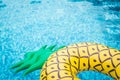 Life ring pineapple In the pool summer Royalty Free Stock Photo