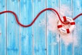 Life Ring with Red Rope on Blue Wood Background Royalty Free Stock Photo