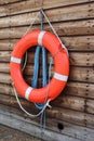 Life ring on wooden panels