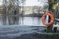 Life safety orange ring buoy at deep water private fishing lake