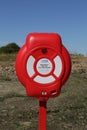 Life saving buoy on beach Royalty Free Stock Photo