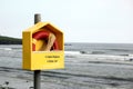 Life saving ring on beach Royalty Free Stock Photo