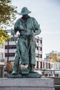 Life-size bronze monument of a mine worker