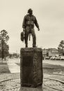 Life size Bronze sculpture of Russell Dougherty by Edmond artist Mary Lou Gresham in Edmond, Oklahoma.