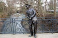 Bronze statue of Elvis Presley, on the pedestrian bridge over the Usa river in the Kurpark, Bad Nauheim, Germany