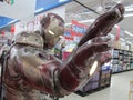 A life size Marvel hero Iron Man figure striking a pose at a departmental store mart