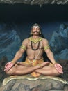 Life size sculpture of demon king Ravana in meditation pose