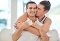 Life together is always special. Shot of a gay couple relaxing together at home. Royalty Free Stock Photo