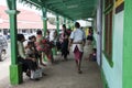 Street life in Tonga. Colorful and traditional dressed people in street of Tonga. Royalty Free Stock Photo