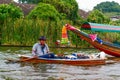 Vendor in Bangkok on a longtail river boat