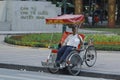 Hanoi, Vietnam, : Life in vietnam- Cyclo beside Sword lake in hanoi, vietnam. Cyclo is the tourist`s farvourite vehicle Royalty Free Stock Photo