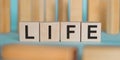 Life word written on wood block. Life coach text for your desing, concept