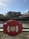 Lifebelt on the quayside Royalty Free Stock Photo