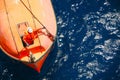 A lifeboat or life raft carried for emergency evacuation in the event of a disaster aboard a ship.