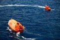 A lifeboat or life raft carried for emergency evacuation in the event of a disaster aboard a ship.
