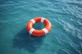 A lifebuoy in blue ocean waters. Insurance and guarantee conditions. Help with advice and support. Problem-solving resilience.