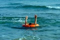 Drowning man with a lifebuoy Royalty Free Stock Photo