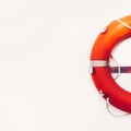 Lifebuoy hanging on white wall. Vintage style Royalty Free Stock Photo