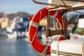 A lifebuoy hangs on the outside of a small fishing boat. Royalty Free Stock Photo