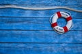 Lifebuoy or life preserver, Maritime Decoration on a blue weathered wood