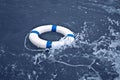 Lifebuoy, lifebelt, lifesaver in ocean storm as help, hope concept