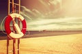 Lifebuoy on Sandy Beach Royalty Free Stock Photo