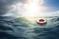 Lifebuoy in a stormy blue sea Royalty Free Stock Photo