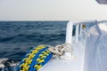 Lifebuoy tethered to the railing of the deck of cruise ship Royalty Free Stock Photo