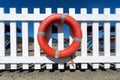 Lifebuoy on wooden fence