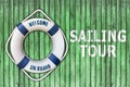 Lifebuoy on wooden floor and sailing tour