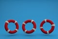 Lifebuoys levitate on a blue background. place for text. 3D render