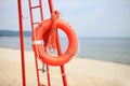 Lifeguard beach rescue equipment orange lifebuoy Royalty Free Stock Photo