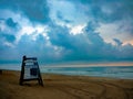 Lifeguard chair on beach with storm clouds Royalty Free Stock Photo