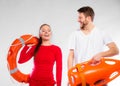 Lifeguard couple with rescue equipment Royalty Free Stock Photo