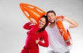 Lifeguard couple with rescue equipment Royalty Free Stock Photo