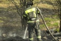 Lifeguard on duty. Firefighter puts out fire. Details of fire. Rescuer in Russia