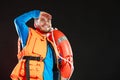 Lifeguard in life vest with ring buoy lifebuoy. Royalty Free Stock Photo