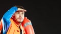 Lifeguard in life vest with ring buoy lifebuoy.