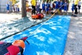 Lifeguard reining water drowning dummyscue course with tra Royalty Free Stock Photo