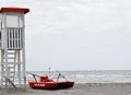 Lifeguard with rescue pedal boats and tower