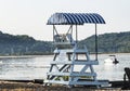 Lifeguard stand with a cover looking over the bay Royalty Free Stock Photo