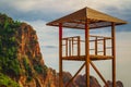 Lifeguard station near a rock