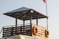 Lifeguard tower on the beach on sky background. Rescue station Royalty Free Stock Photo