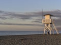 Lifeguard tower beach at sunrise with nobody Royalty Free Stock Photo